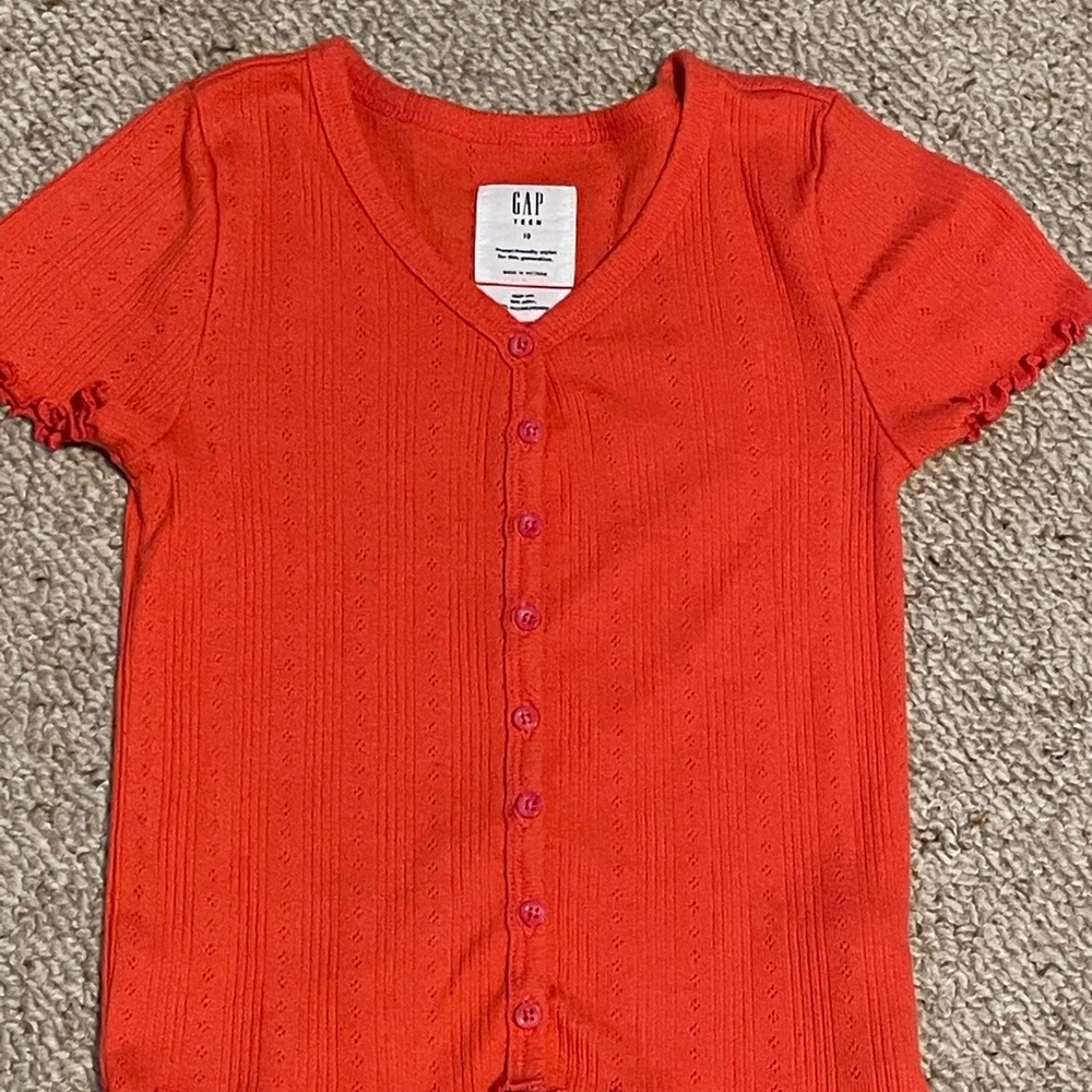 BUTTON UP CROPED SHIRT— orange fringe on the bottoms and ends of sleeves
